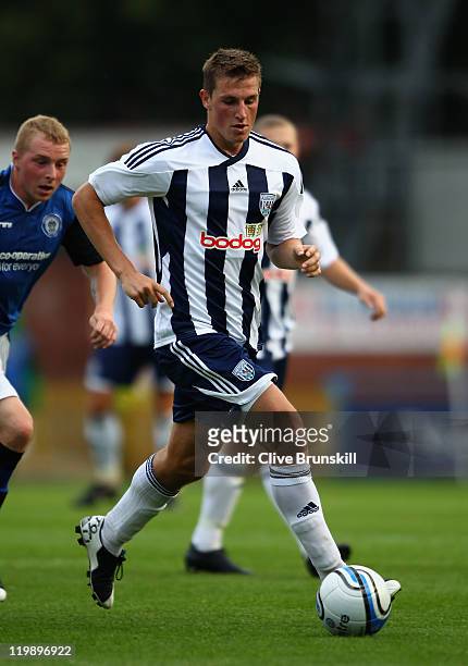 Chris Wood of West Bromwich Albion in action during the pre season friendly match between Rochdale and West Bromwich Albion at Spotland Stadium on...