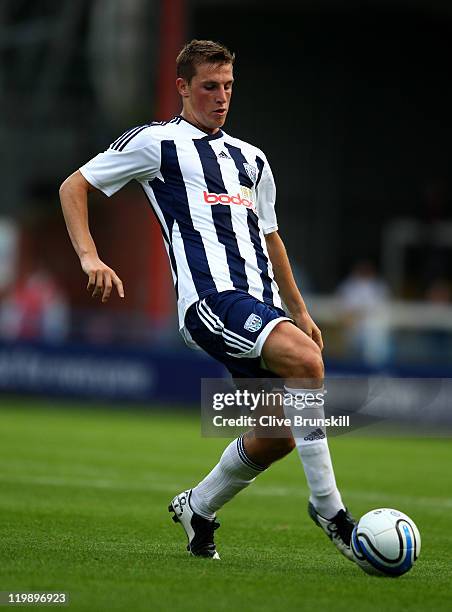 Chris Wood of West Bromwich Albion in action during the pre season friendly match between Rochdale and West Bromwich Albion at Spotland Stadium on...