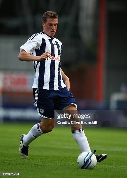 Chris Wood of West Bromwich Albion in action during the pre season friendly match between Rochdale and West Bromwich Albion at Spotland Stadium on...