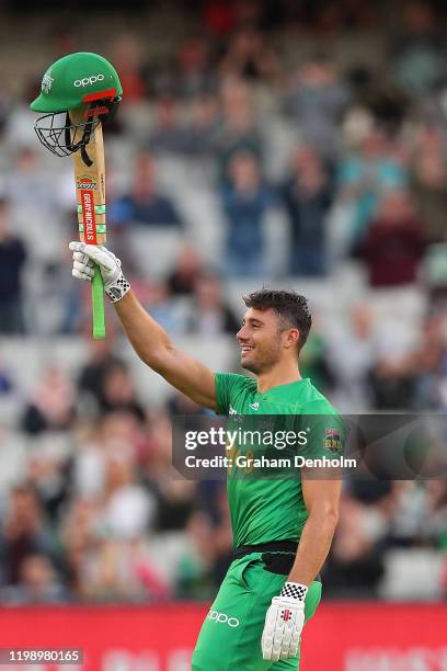 Marcus Stoinis of the Stars celebrates reaching 100 runs during the Big Bash League match between the Melbourne Stars and the Sydney Sixers at the...