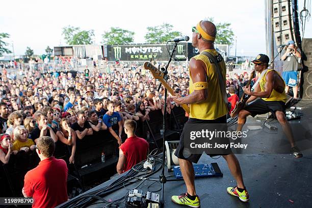 Bret Bollinger and Kaleo Wassman of the band Pepper performs in fronnt of a huge crowd during the 2011 Vans Warped Tour at the Marcus Amphitheater on...