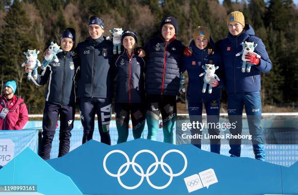 Silver medalist Linda Zingerle and Marco Barele of Italy, gold medalist Jeanne Richard and Mathieu Garcia of France and bronze medalist Sara...