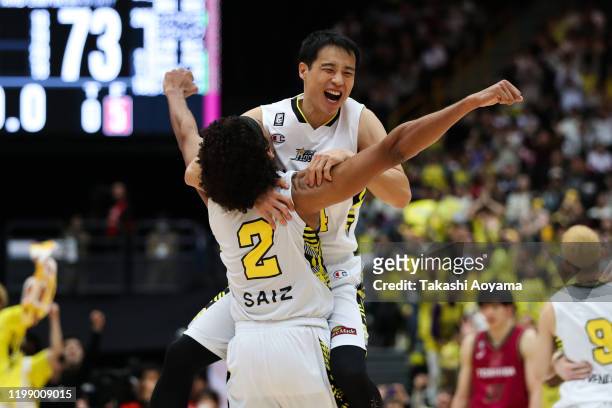 Sebastian Saiz and Kenta Hirose of Sun Rockers Shibuya celebrate the victory during the basketball Emperor's Cup final between Sun Rockers Shibuya...