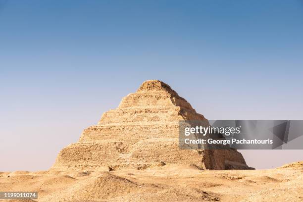 step pyramid of djoser in saqqara, egypt - ピラミッド ストックフォトと画像