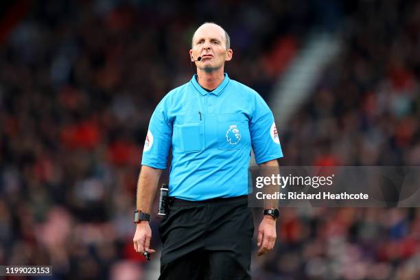 Referee Mike Dean reacts during the Premier League match between AFC Bournemouth and Watford FC at Vitality Stadium on January 12, 2020 in...