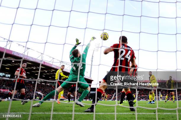 Roberto Pereyra of Watford scores his sides third goal during the Premier League match between AFC Bournemouth and Watford FC at Vitality Stadium on...