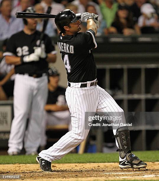 Paul Konerko of the Chicago White Sox hits a game-tying, two-run home run in the 6th inning against the Detroit Tigers at U.S. Cellular Field on July...