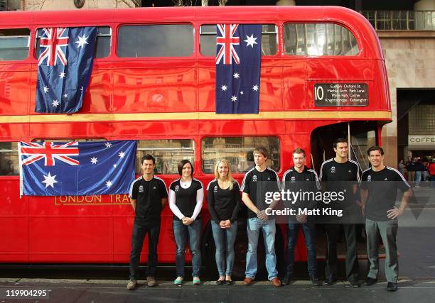 Australian athletes pose outside a traditional London bus during an Australian Olympic Committee media session to signal one year to go until the...