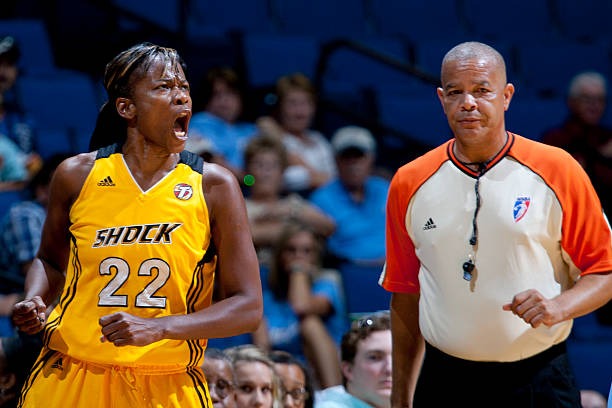 Sheryl Swoopes of the Tulsa Shock celebrates drawing a foul during last minutes of the WNBA game on July 26, 2011 at the BOK Center in Tulsa,...