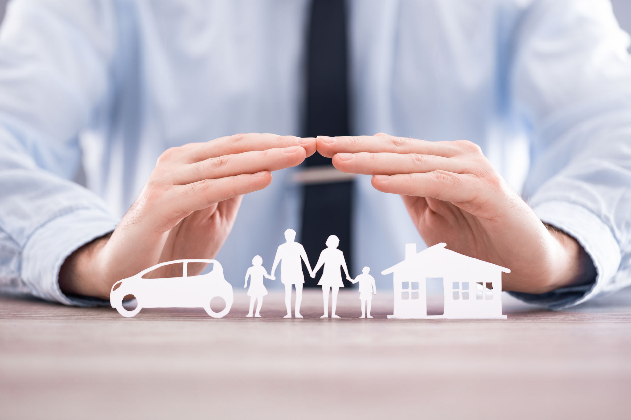 family with insurance agent