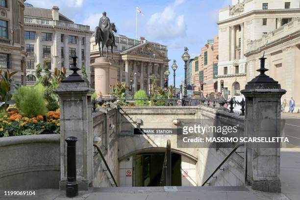 the bank station tube entrance in bank junction road in center london - monuments in london stock pictures, royalty-free photos & images