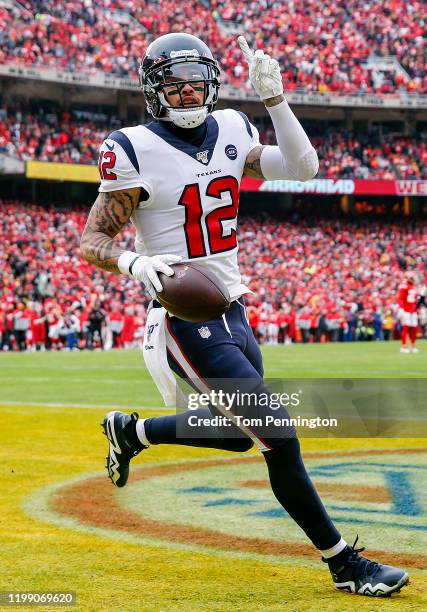 Kenny Stills of the Houston Texans celebrates his 54-yard touchdown reception during the first quarter against the Kansas City Chiefs in the AFC...