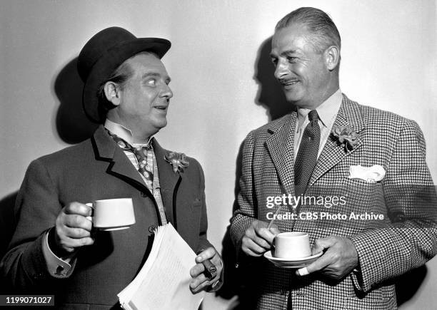 The Lady Esther Screen Guild Players, a CBS Radio dramatic anthology program. Episode: The Informer. Pictured Left to right: actors Wallace Ford and...