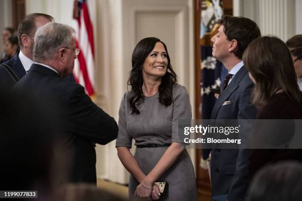Stephanie Grisham, White House Press Secretary, speaks with Keith Kellogg, national security advisor to U.S. Vice President Mike Pence, left, and...