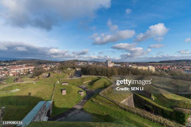 aerial view of belfort castle and the cityscapes in a sunny day - belfort foto e immagini stock