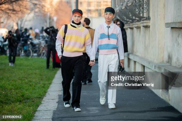Guests seen outside Prada during Milan Fashion Week Fall/Winter 2020/2021 on January 12, 2020 in Milan, Italy.