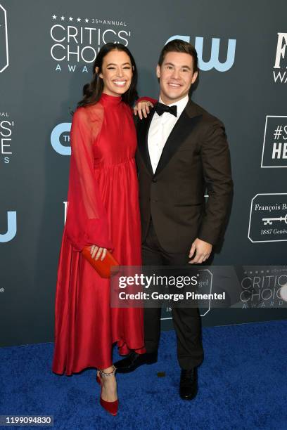 Chloe Bridges and Adam DeVine attend the 25th Annual Critics' Choice Awards held at Barker Hangar on January 12, 2020 in Santa Monica, California.