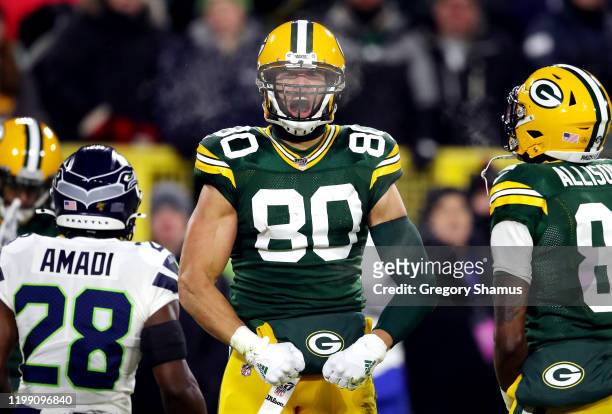 Jimmy Graham of the Green Bay Packers celebrates after a reception during the first quarter against the Seattle Seahawks in the NFC Divisional...