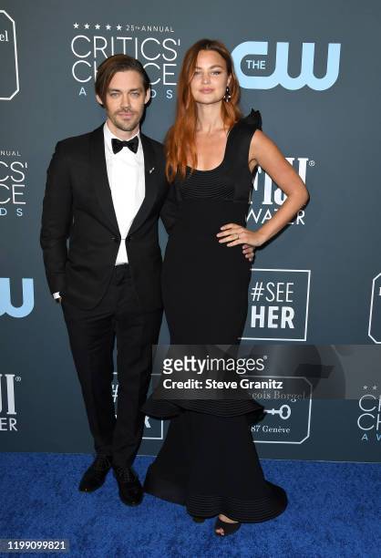Tom Payne and Jennifer Åkerman attend the 25th Annual Critics' Choice Awards at Barker Hangar on January 12, 2020 in Santa Monica, California.