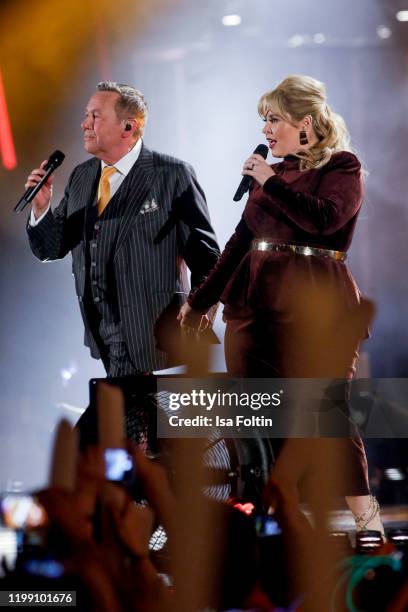 German singer Roland Kaiser and Irish singer Maite Kelly perform during the television show "Schlagerchampions - Das grosse Fest der Besten" at...
