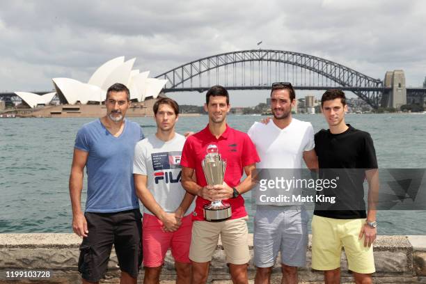 Nenad Zimonjic, Dusan Lajovic, Novak Djokovic, Viktor Troicki and Nikola Cacic of Team Serbia pose with the ATP Cup during a media opportunity after...