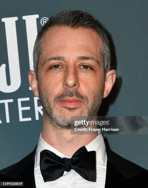 Jeremy Strong poses in the press room with the Best Actor in a Drama Series award for 'Succession' during the 25th Annual Critics' Choice Awards at...