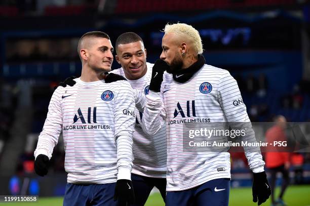 Neymar Jr, Marco Verratti and Kylian Mbappe of Paris Saint-Germain react during warmup before the Ligue 1 match between Paris Saint-Germain and AS...