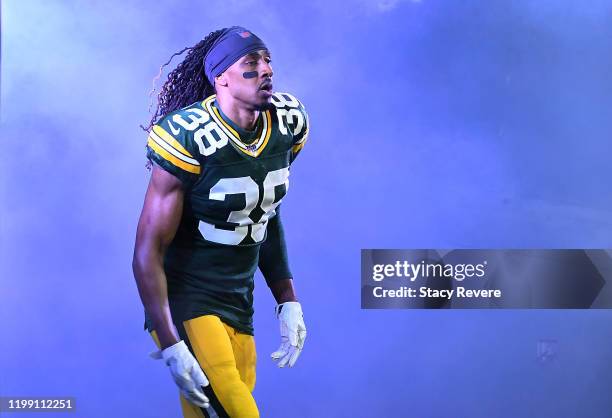 Tramon Williams of the Green Bay Packers runs onto the field as he is introduced before the NFC Divisional Playoff game against the Seattle Seahawks...