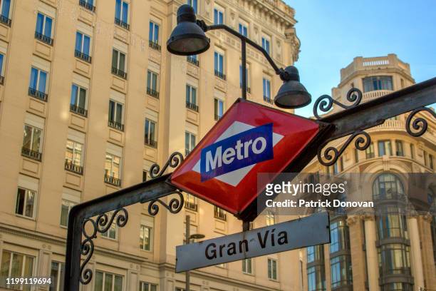 metro entrance and logo, madrid, spain - metro madrid stock pictures, royalty-free photos & images