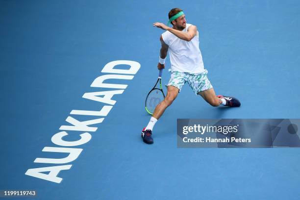 Tennys Sandgren of USA plays a forehand against Michael Venus of New Zealand during day one of the 2020 Men's ASB Classic at ASB Tennis Centre on...