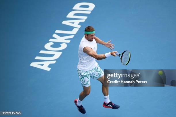 Tennys Sandgren of USA plays a forehand against Michael Venus of New Zealand during day one of the 2020 Men's ASB Classic at ASB Tennis Centre on...