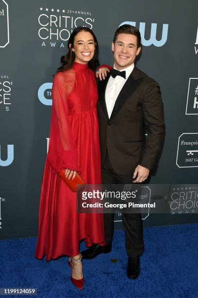 Chloe Bridges and Adam DeVine attend the 25th Annual Critics' Choice Awards held at Barker Hangar on January 12, 2020 in Santa Monica, California.