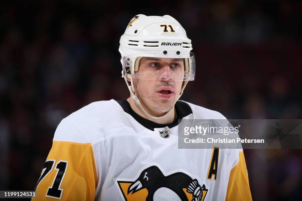 Evgeni Malkin of the Pittsburgh Penguins skates up to a face off against the Arizona Coyotes during the first period of the NHL game at Gila River...