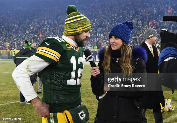 Aaron Rodgers of the Green Bay Packers is interviewed by Erin Andrews after defeating the Seattle Seahawks 28-23 in the NFC Divisional Playoff game...