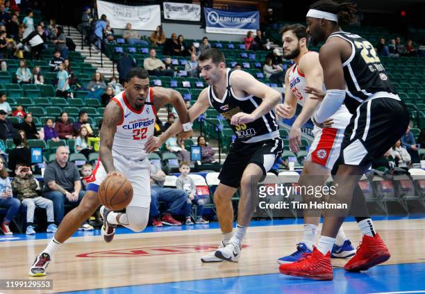 Xavier Rathan-Mayes of the Agua Caliente Clippers drives against Dakota Mathias of the Texas Legends during the first quarter on February 06, 2020 at...