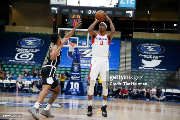 Donte Grantham of the Agua Caliente Clippers shoots over Cameron Payne of the Texas Legends during the first quarter on February 06, 2020 at Comerica...