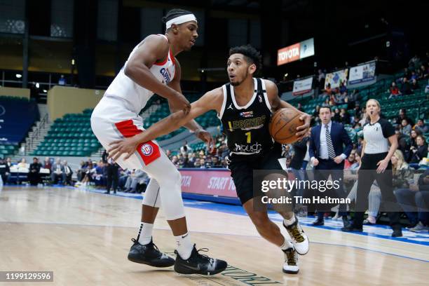 Cameron Payne of the Texas Legends drives against Donte Grantham of the Agua Caliente Clippers during the fourth quarter on February 06, 2020 at...