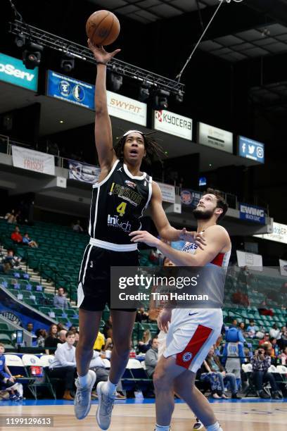 Moses Brown of the Texas Legends shoots against J. J. Avila of the Agua Caliente Clippers during the fourth quarter on February 06, 2020 at Comerica...