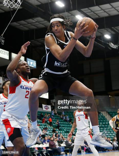 Moses Brown of the Texas Legends grabs a rebound against Tyler Roberson of the Agua Caliente Clippers during the fourth quarter on February 06, 2020...