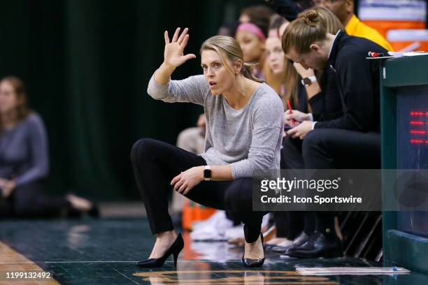 Northern Kentucky Norse head coach Camryn Whitaker on the sideline during the third quarter of the women's college basketball game between the...