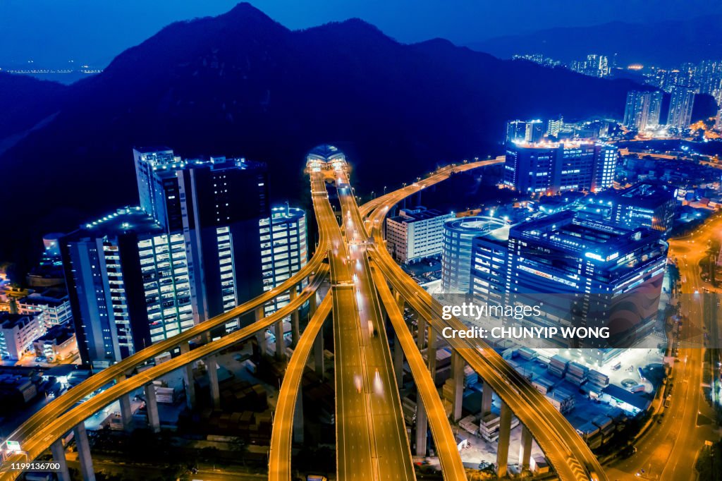 Aerial view of traffic and overpasses in Hong Kong at night