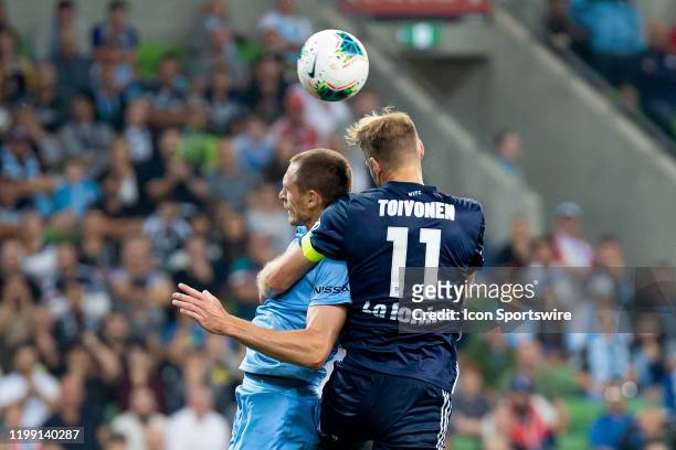 Melbourne Victory forward Nils Ola Toivonen competes for the header during the round 18 A-League soccer match between Melbourne City FC and Melbourne...