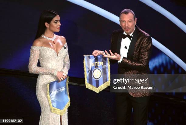 Talian Sanremo Festival artistic director Amadeus and Argentine model Georgina Rodriguez , partner of Portuguese soccer star Cristiano Ronaldo, pose...