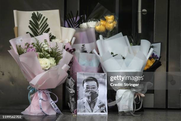 Portrait of Dr. Li Wenliang is left at Li's hospital in Wuhan on February 07,2020 in Wuhan.Hubei province,China. Dr. Li, regarded a whistleblower on...