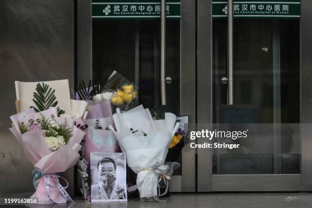 Portrait of Dr. Li Wenliang is left at Li's hospital in Wuhan on February 07,2020 in Wuhan.Hubei province,China. Dr. Li, regarded a whistleblower on...