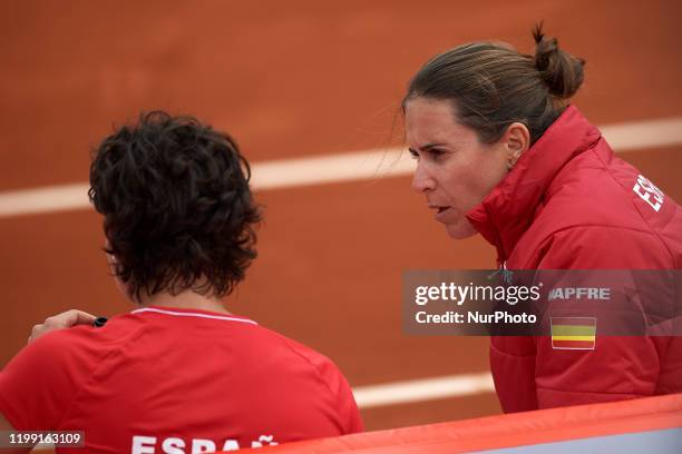 Anabel Medina gives instructions to Carla Suarez during the second match of the 2020 Fed Cup Qualifier between Carla Suarez of Spain and Misaki Doi...