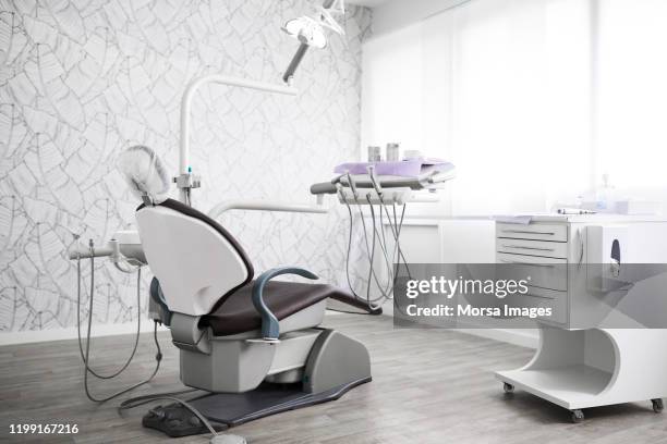 dental chair in medical clinic - dental tools no people stock pictures, royalty-free photos & images