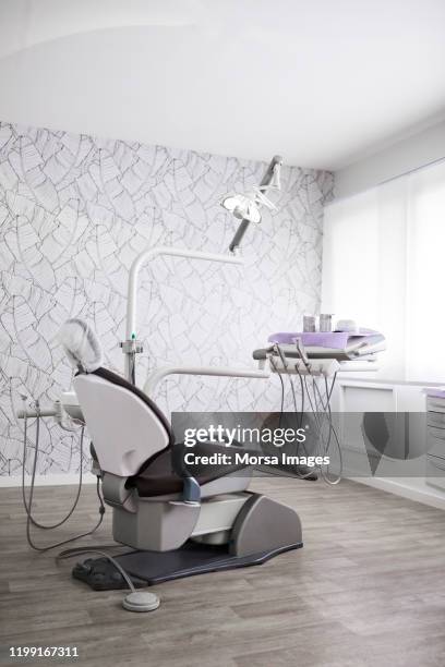 interior of modern dental clinic - dentist's chair stock pictures, royalty-free photos & images