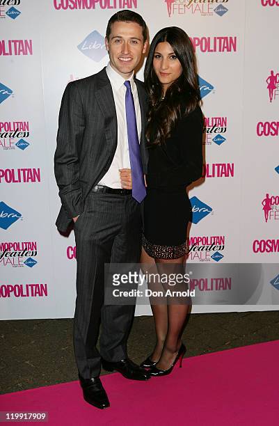 Tom Waterhouse and Hoda Vakili arrive on the pink carpet at the Cosmopolitan Fun, Fearless Females Awards on July 27, 2011 in Sydney, Australia.