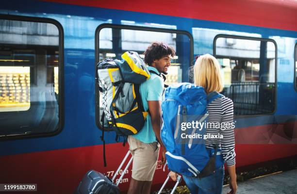 Getting Train Couple Getting On A Train Photos and Premium High Res Pictures - Getty ...
